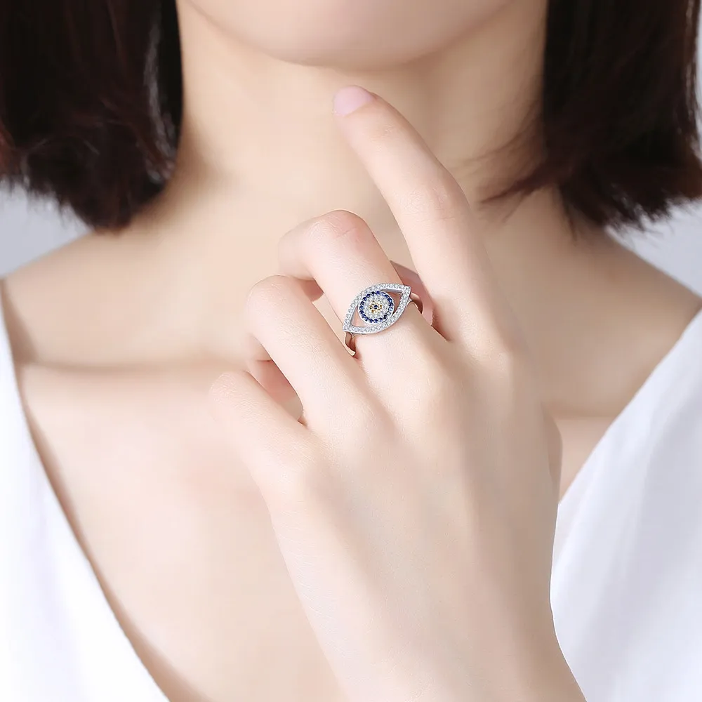 model with evil eye ring