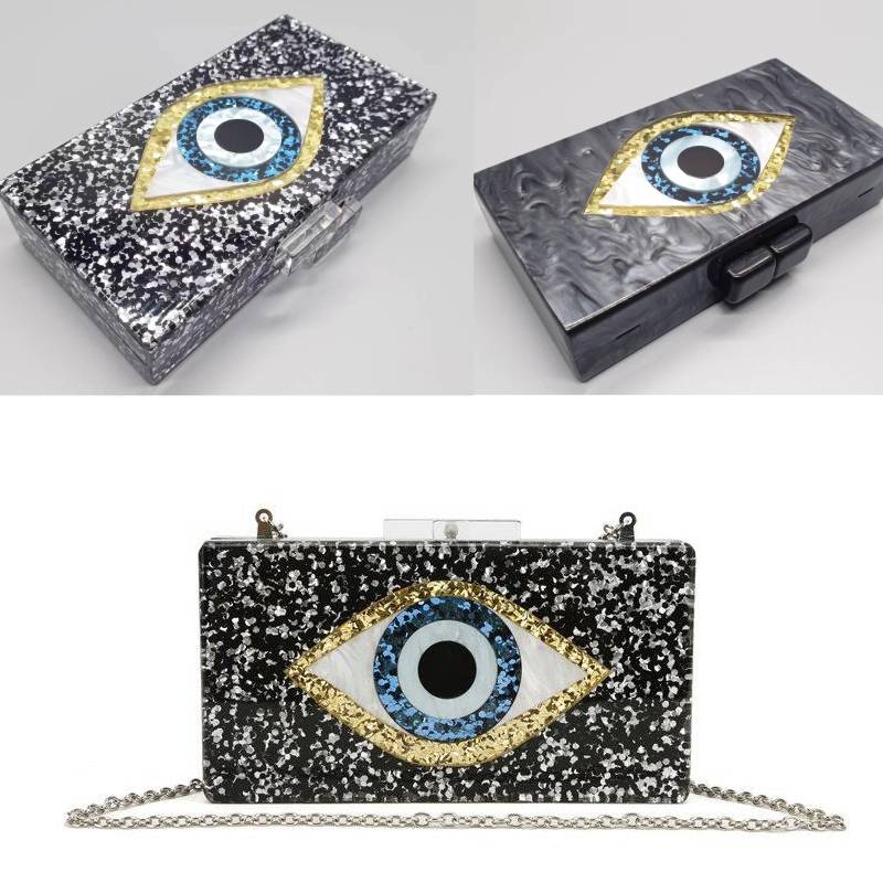 black evil eye purse