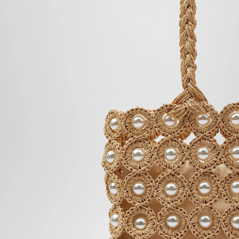 straw tote bag with pearls bds close view