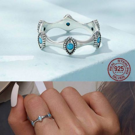 Turquoise Ring with a Protective Charm - Embrace Style with our Evil Eye Accent