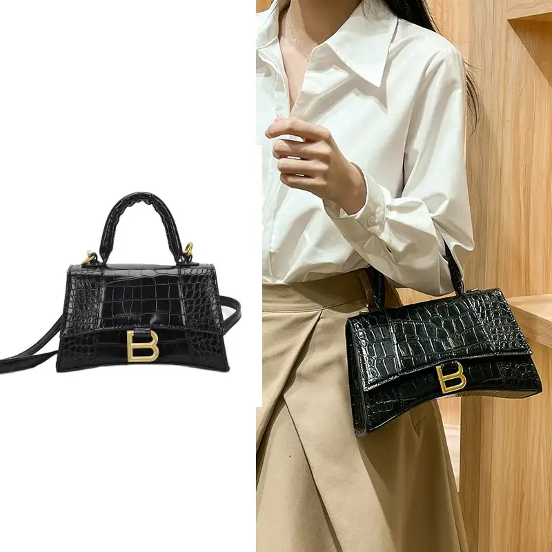 black top handle bag model display