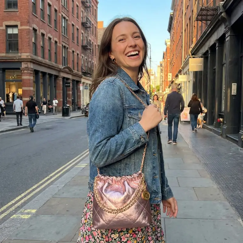 model with pink quilted leather drawstring bag