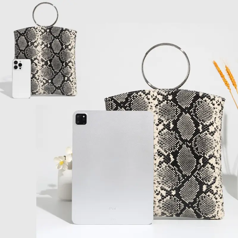 black snakeskin ring handle tote bag with devices