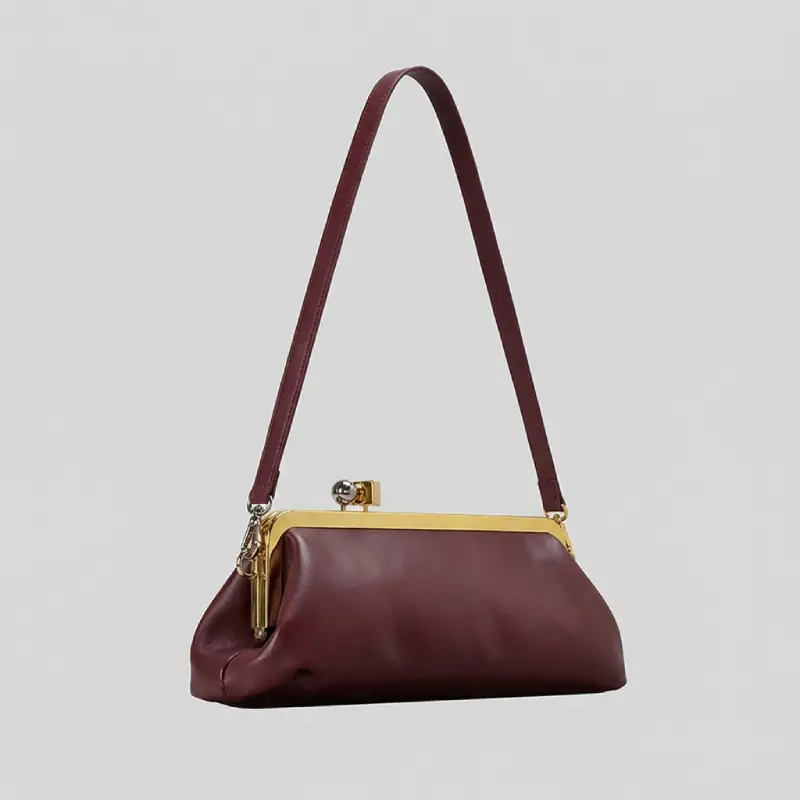 burgundy snap frame bag side view